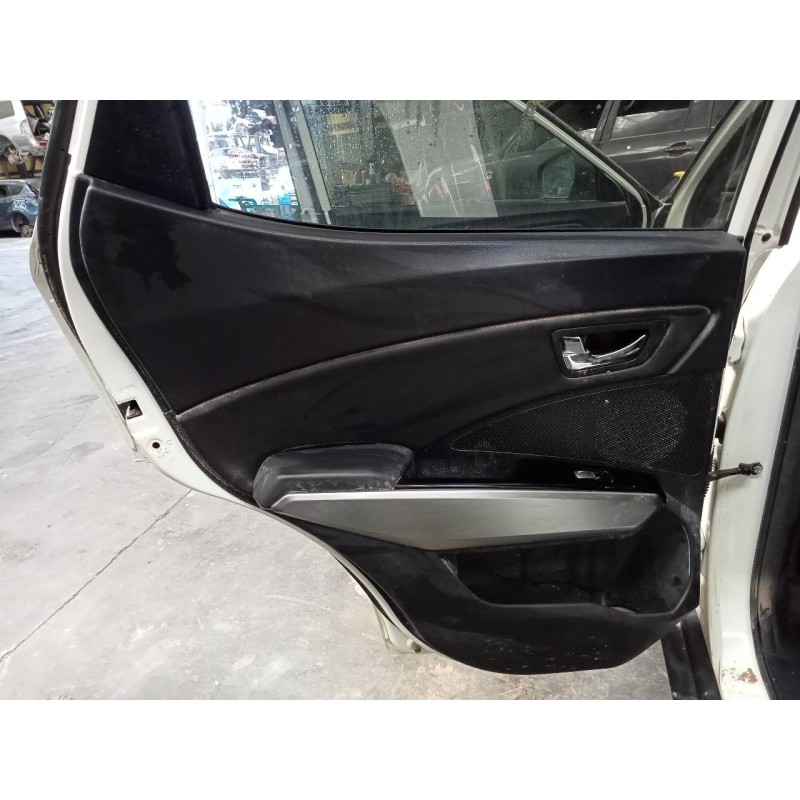 Recambio de guarnecido puerta trasera izquierda para ssangyong tivoli crystal referencia OEM IAM   