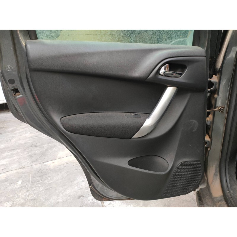 Recambio de guarnecido puerta trasera izquierda para citroen c3 exclusive referencia OEM IAM   