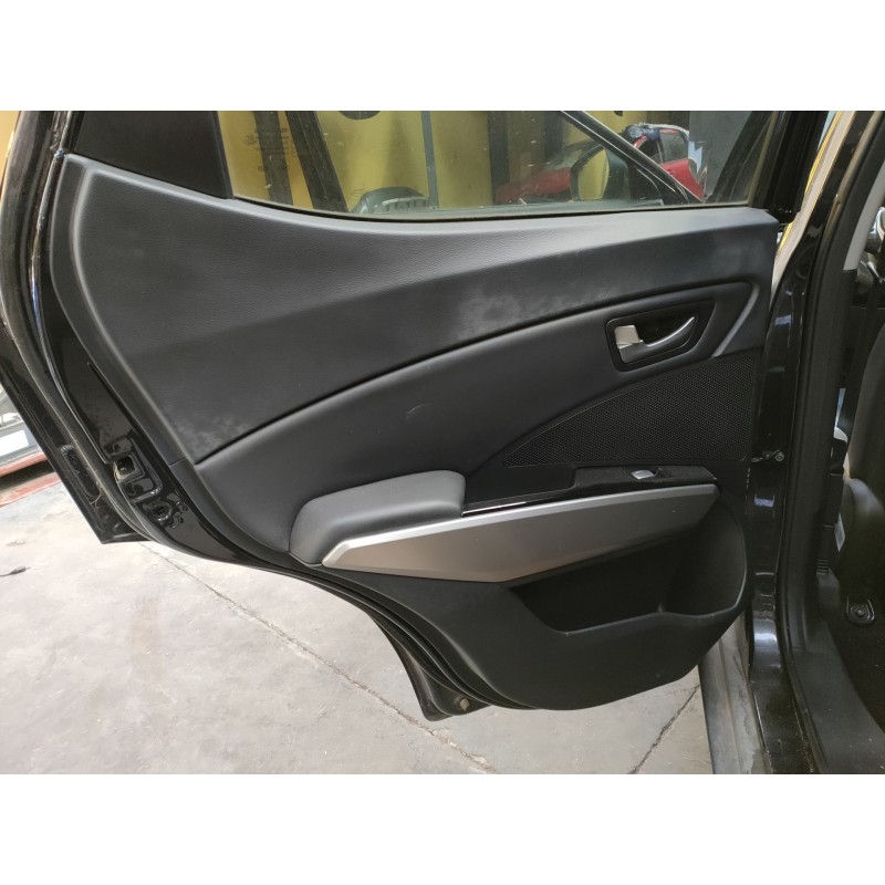 Recambio de guarnecido puerta trasera izquierda para ssangyong tivoli crystal 4x2 referencia OEM IAM   