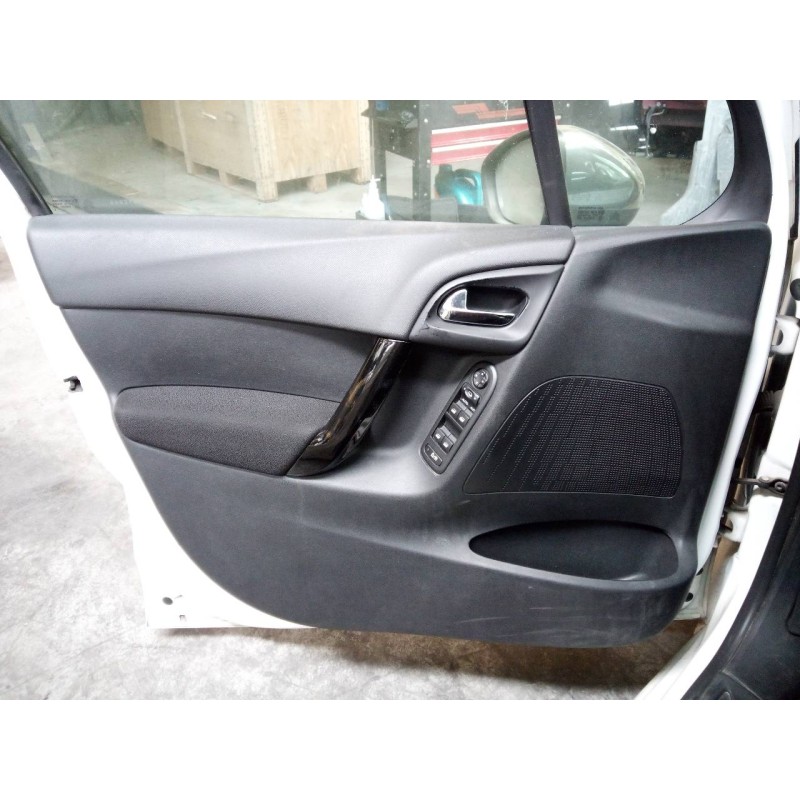 Recambio de guarnecido puerta delantera izquierda para citroen c3 attraction referencia OEM IAM   