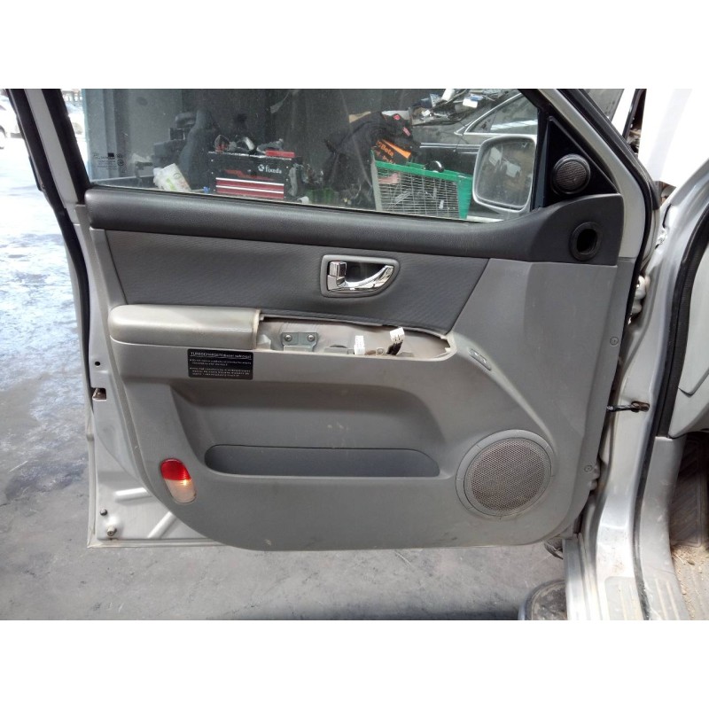 Recambio de guarnecido puerta delantera izquierda para kia sorento 2.5 crdi concept referencia OEM IAM   