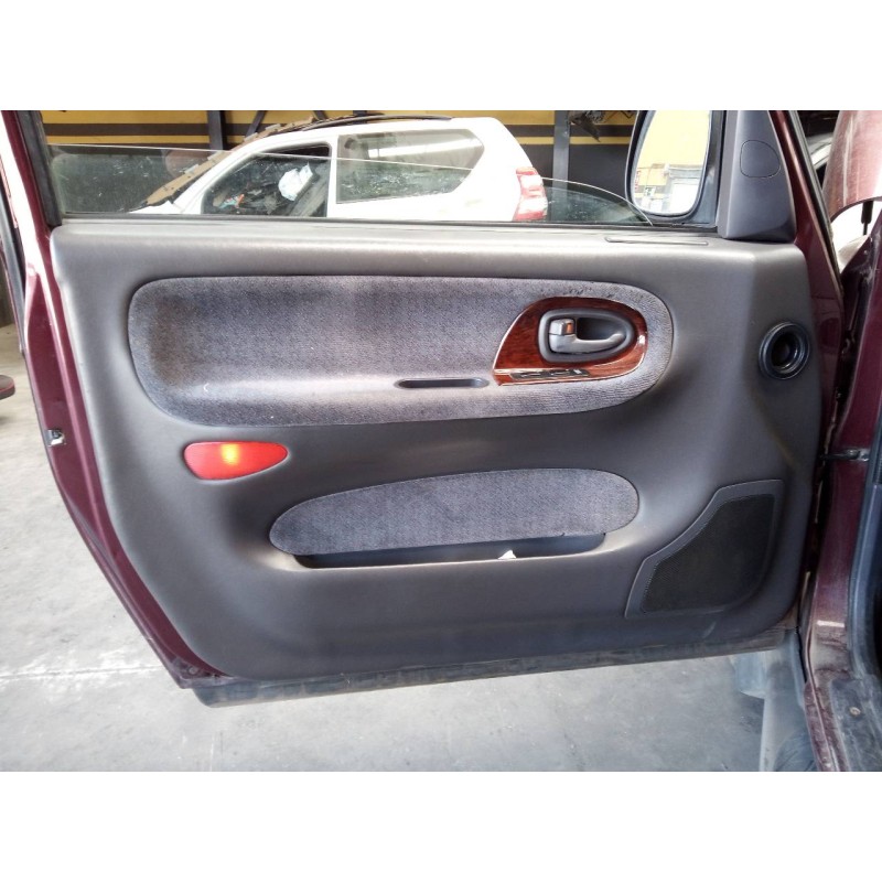 Recambio de guarnecido puerta delantera izquierda para ssangyong korando 2.9 d referencia OEM IAM   