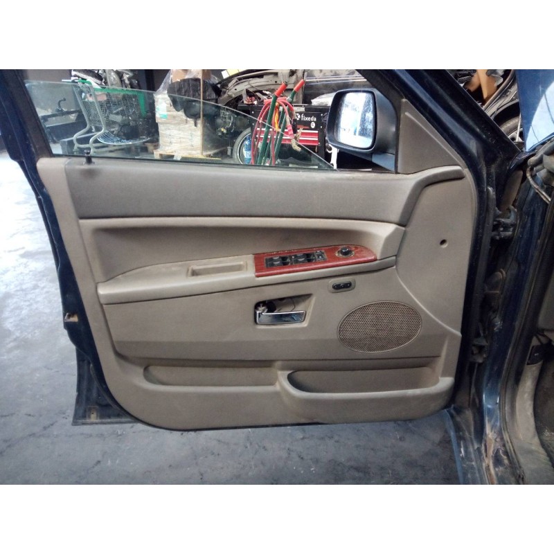 Recambio de guarnecido puerta delantera izquierda para jeep gr. cherokee (wh) 3.0 crd limited referencia OEM IAM   