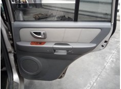 GUARNECIDO PUERTA TRASERA DERECHA 