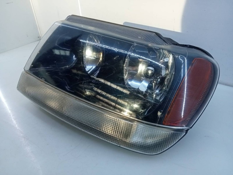 Recambio de faro izquierdo para chrysler jeep gr.cherokee (wj/wg) 3.1 td laredo referencia OEM IAM   E1-B5-51-2