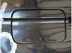 TAPA EXTERIOR COMBUSTIBLE 