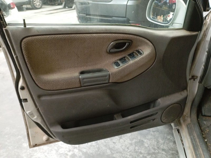 Recambio de guarnecido puerta delantera izquierda para suzuki grand vitara i (ft, ht) 2.0 td 4x4 (sq 420d) referencia OEM IAM   