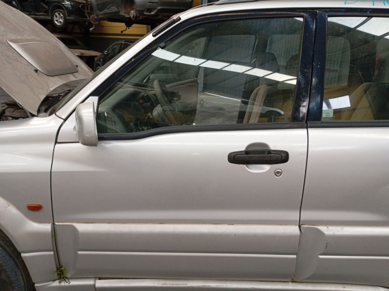 Recambio de puerta delantera izquierda para suzuki grand vitara i (ft, ht) 2.0 td 4x4 (sq 420d) referencia OEM IAM   