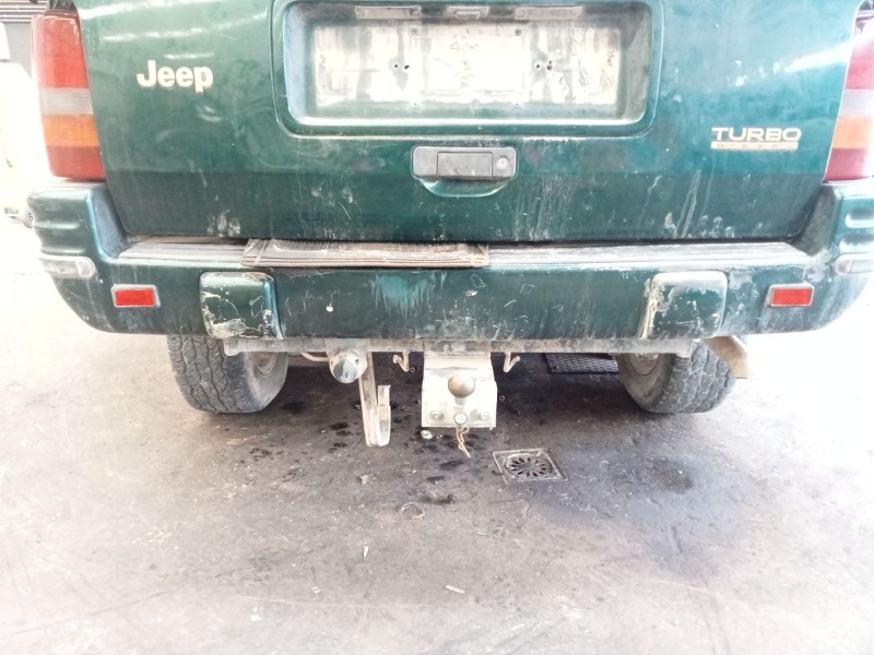 Recambio de paragolpes trasero para jeep grand cherokee i (zj, zg) 2.5 td laredo referencia OEM IAM   