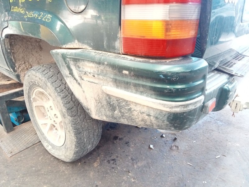 Recambio de paragolpes trasero para jeep grand cherokee i (zj, zg) 2.5 td laredo referencia OEM IAM   