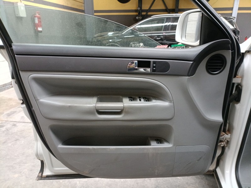 Recambio de guarnecido puerta delantera izquierda para volkswagen touareg (7la, 7l6, 7l7) 2.5 r5 tdi referencia OEM IAM   