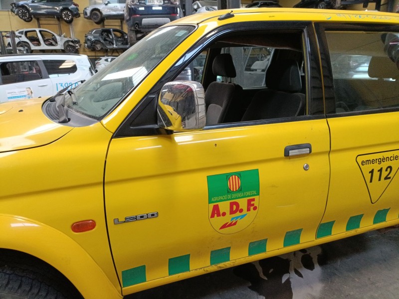 Recambio de puerta delantera izquierda para mitsubishi l200 (k7_t, k6_t, k5_t) 2.5 td 4wd (k74t) referencia OEM IAM   